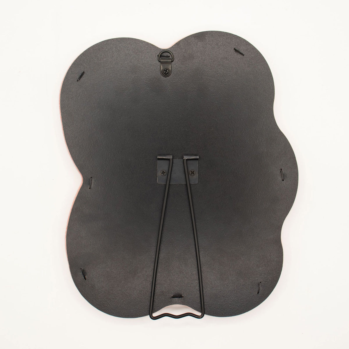Back of a mirror Black pebble-shaped on a white background