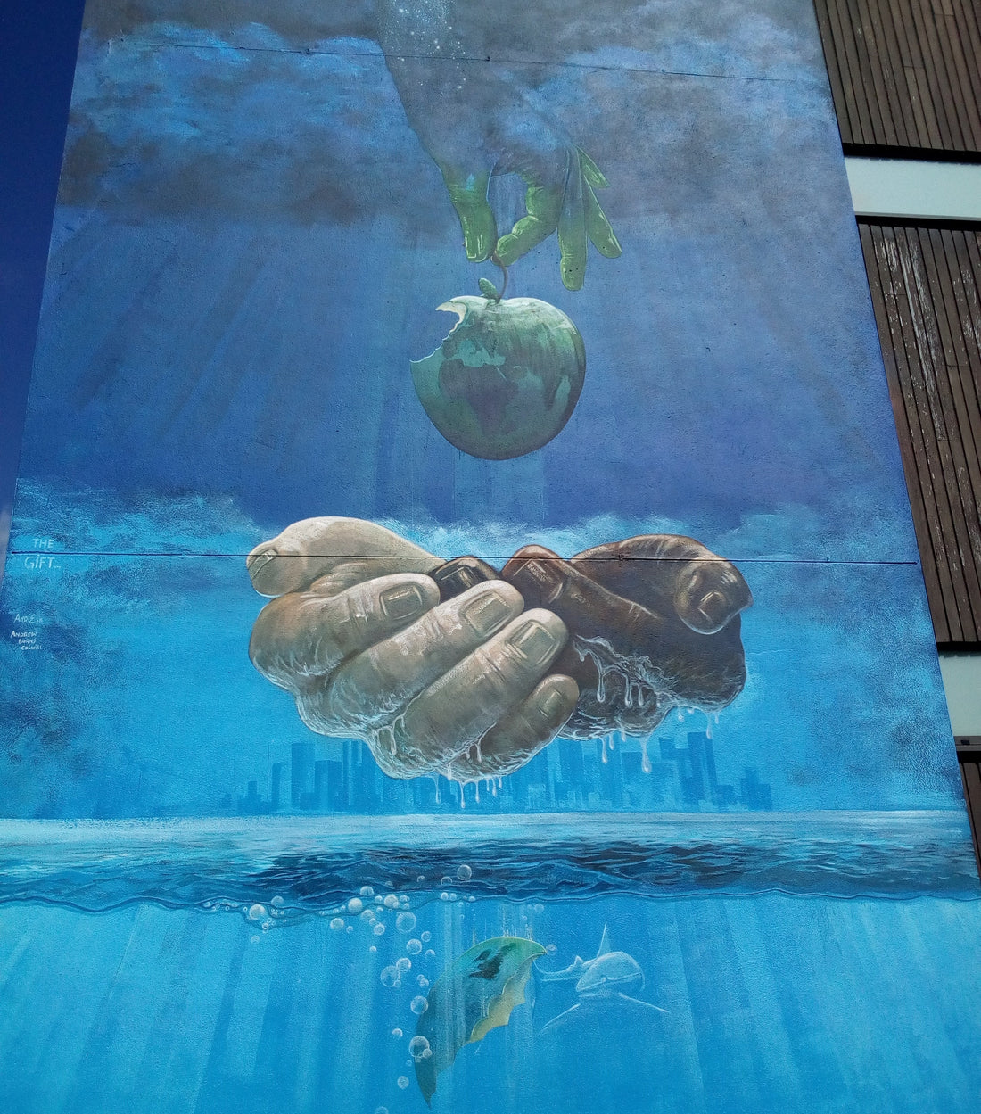 street art with hands underwater