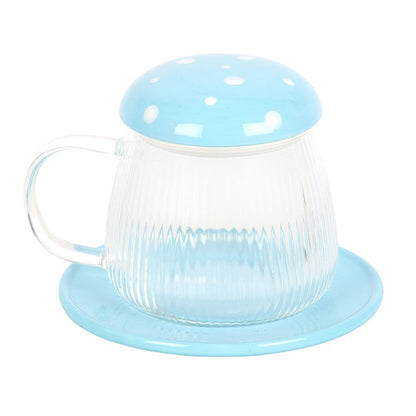 Clear glass mug with blue lid and base on a white background