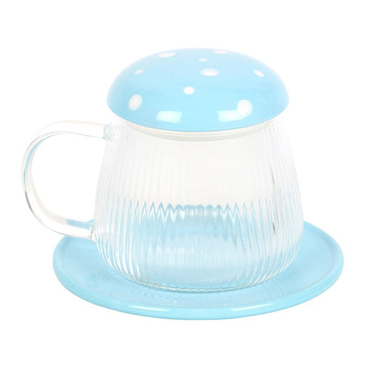 Clear glass mug with blue lid and base on a white background