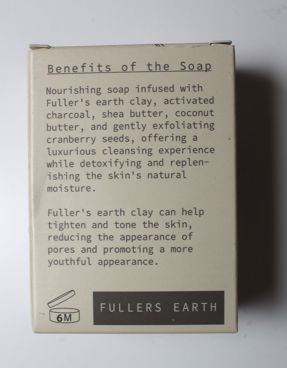 The back of a beige cardboard box for Fuller's Earth Clay soap, featuring descriptive text about its benefits and ingredients, with the brand name 'FULLERS EARTH' printed at the bottom.