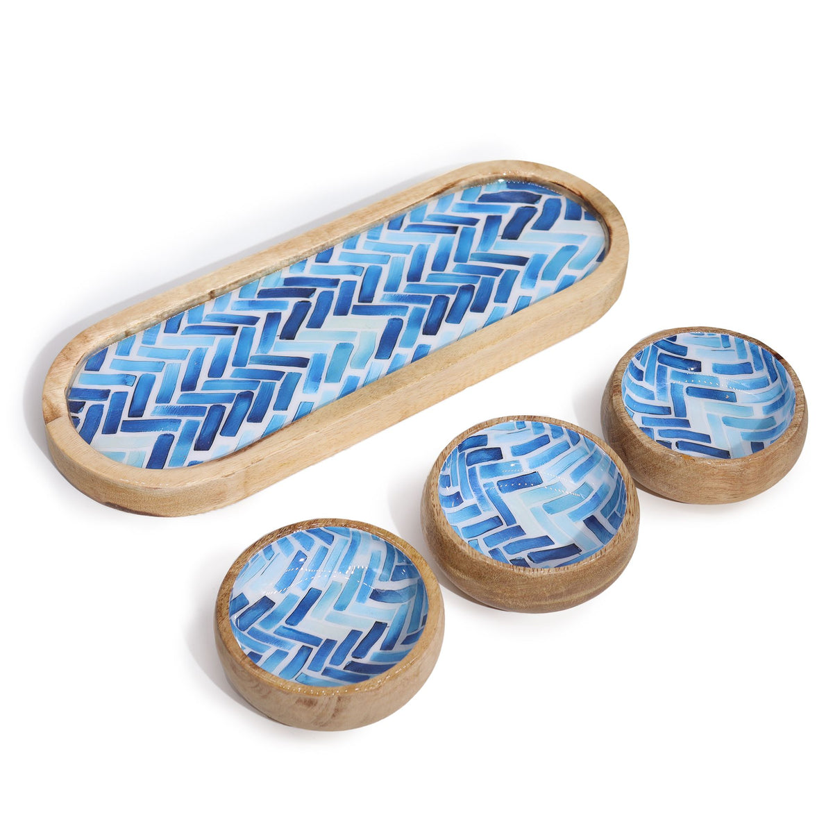 Set of three wooden bowls with blue geometric pattern on a white background