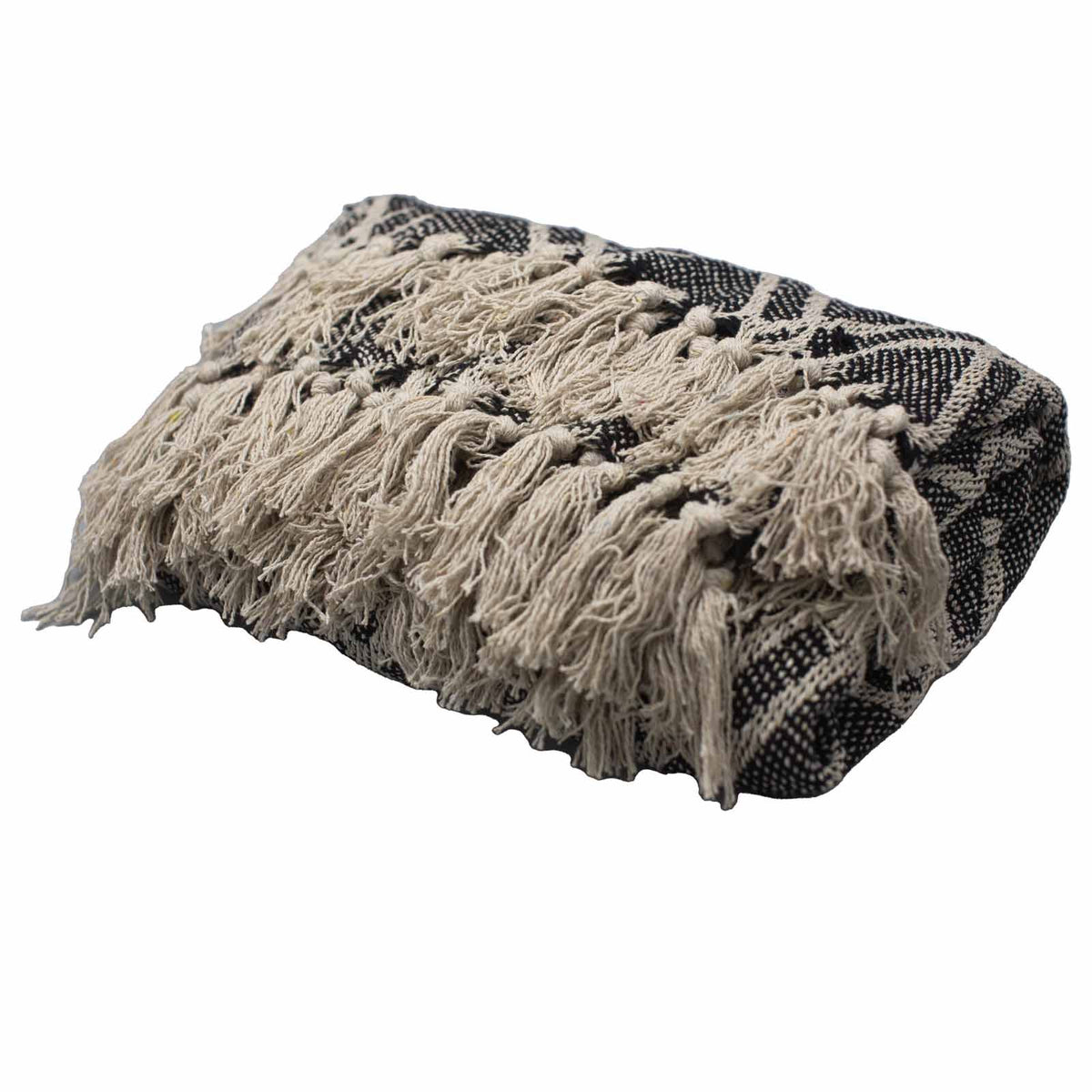 Textured blanket with tassels on a white background
