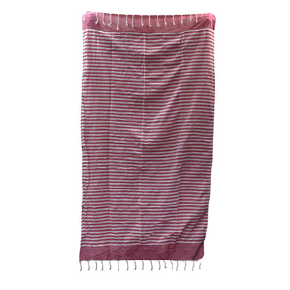 Striped pink and white towel on a white background