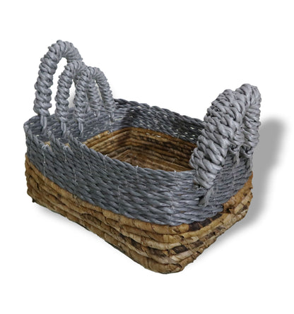 Woven basket with gray handles on a white background