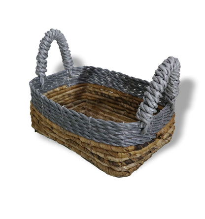Woven basket with gray handles on a white background