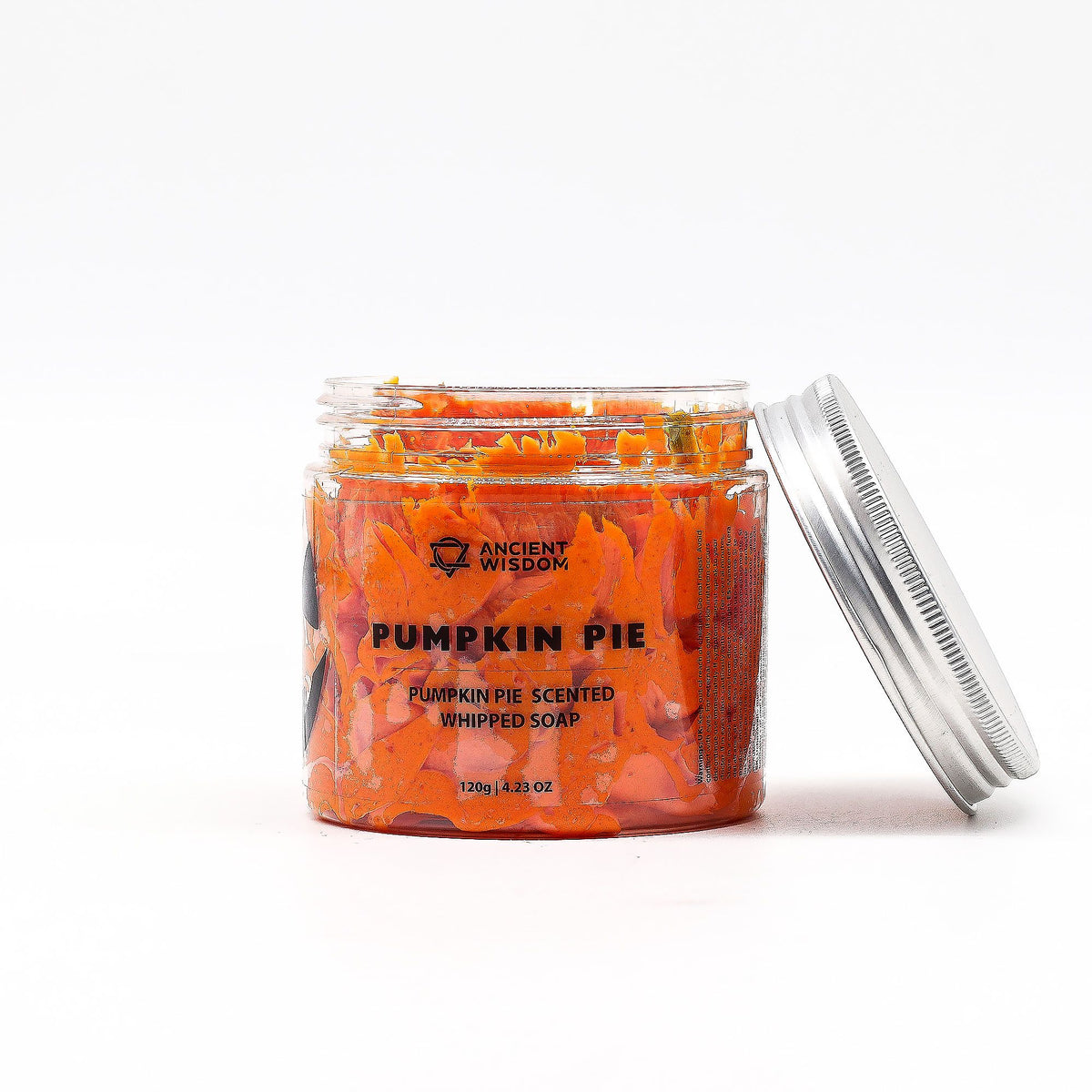 Jar of pumpkin pie scented whipped soap with a white background