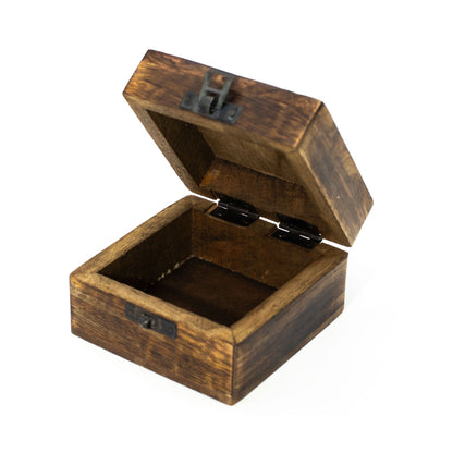 Wooden jewelry box with a hinged lid on a white background