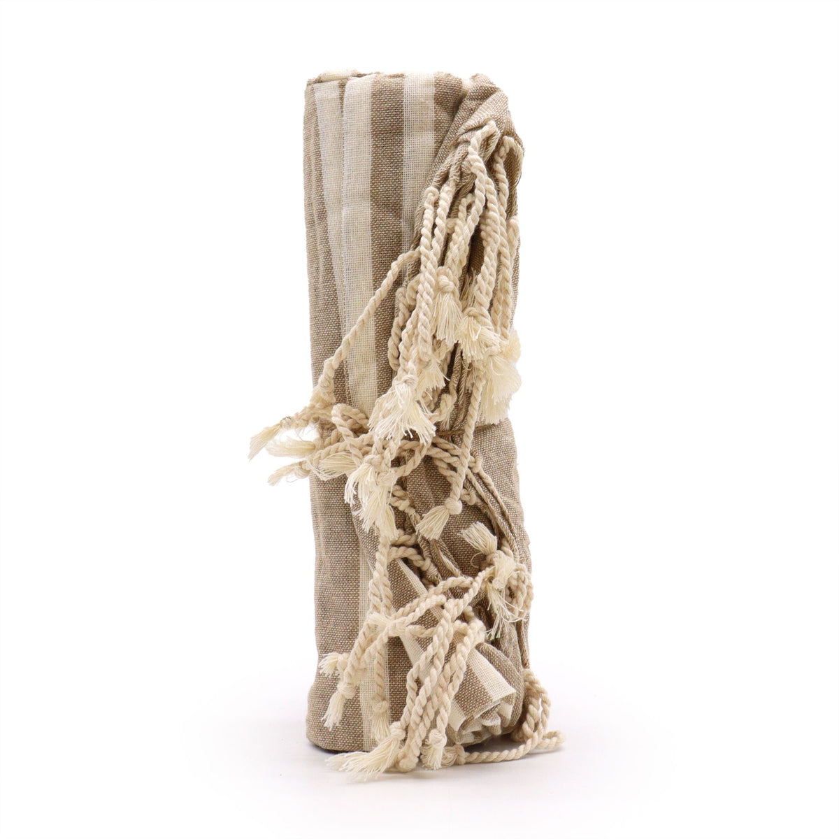 Beige towel with tassels on a white background