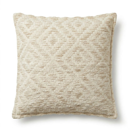 Textured beige pillow on a white background