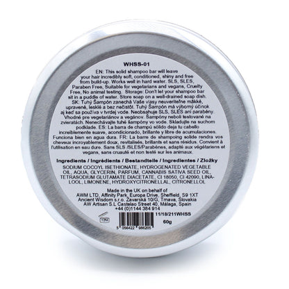 Back of a solid shampoo bar packaging with text and product details.