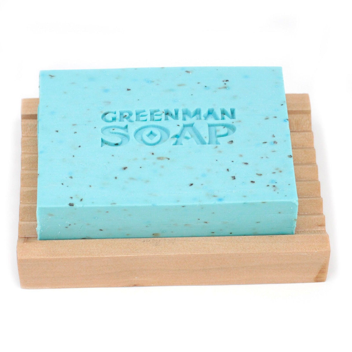Greenman soap bar on wooden holder with white background 