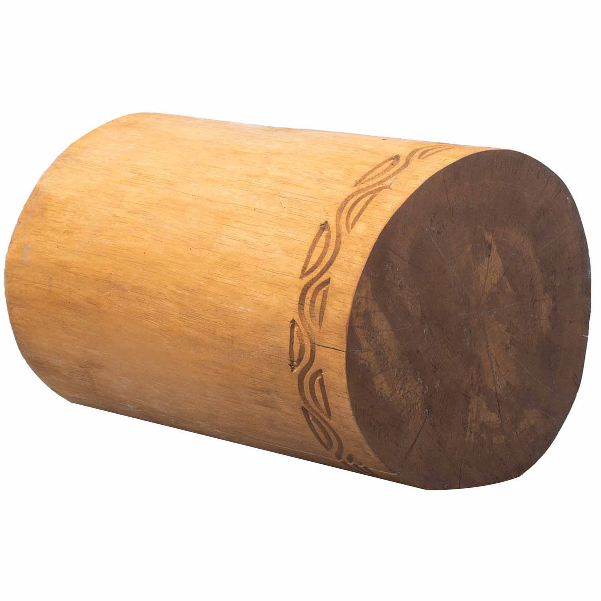 Wooden cylindrical table or stool with engraved design on a white background