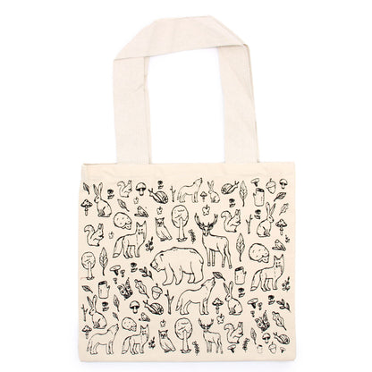 Tote bag with black animal and nature illustrations on a white background