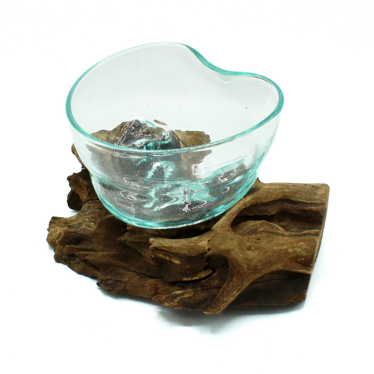 Clear glass bowl with water on a wooden stand against a white background