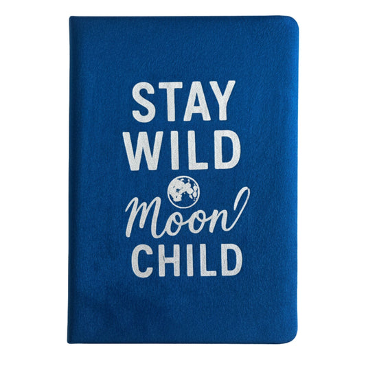 Blue notebook with 'Stay Wild Moon Child' text on a white background