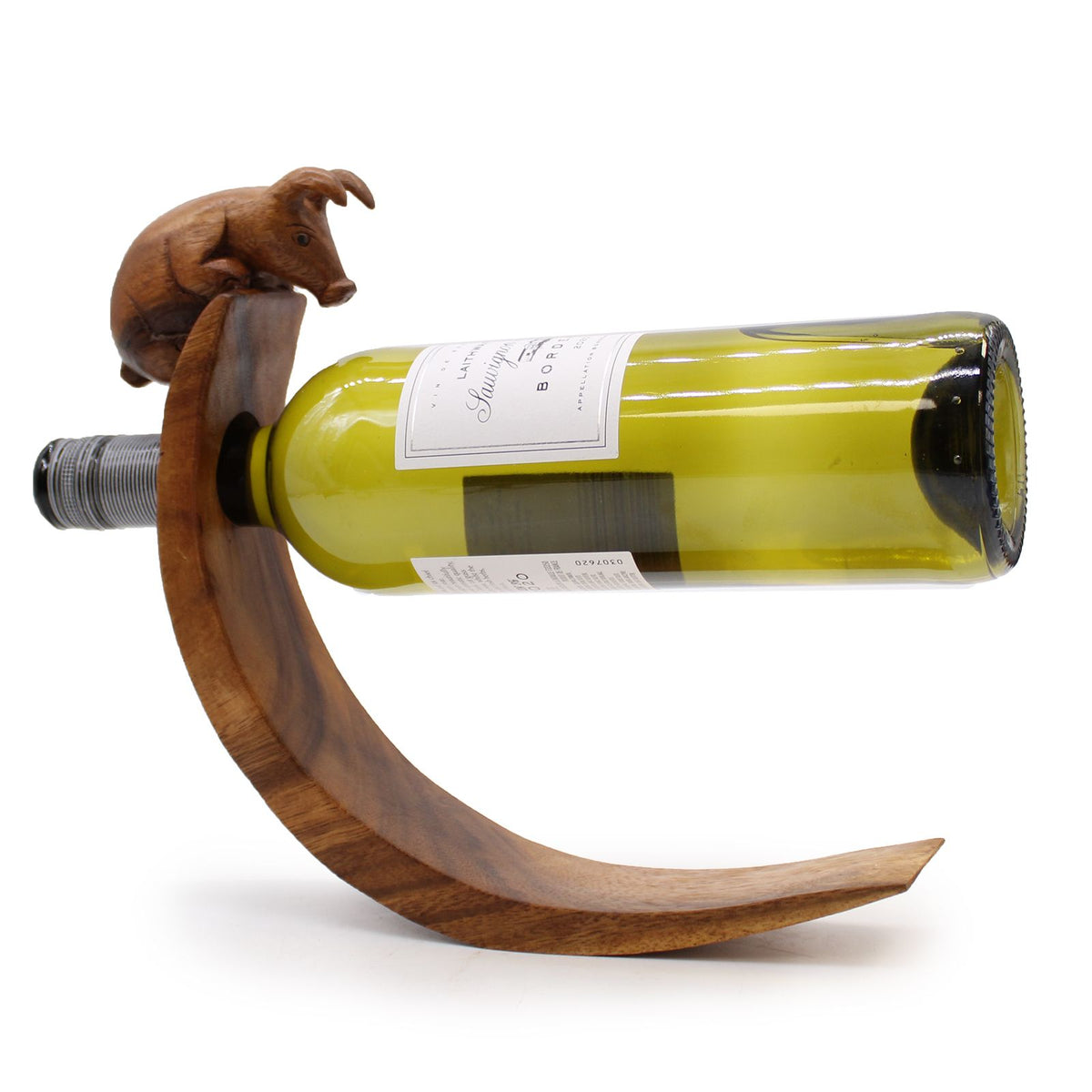 Wooden wine bottle holder with balancing pig and a wine bottle on a white background