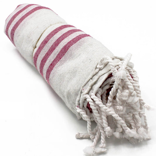 Rolled-up towel with red and white stripes on a white background