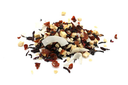 Assorted dried fruits and nuts on a white background