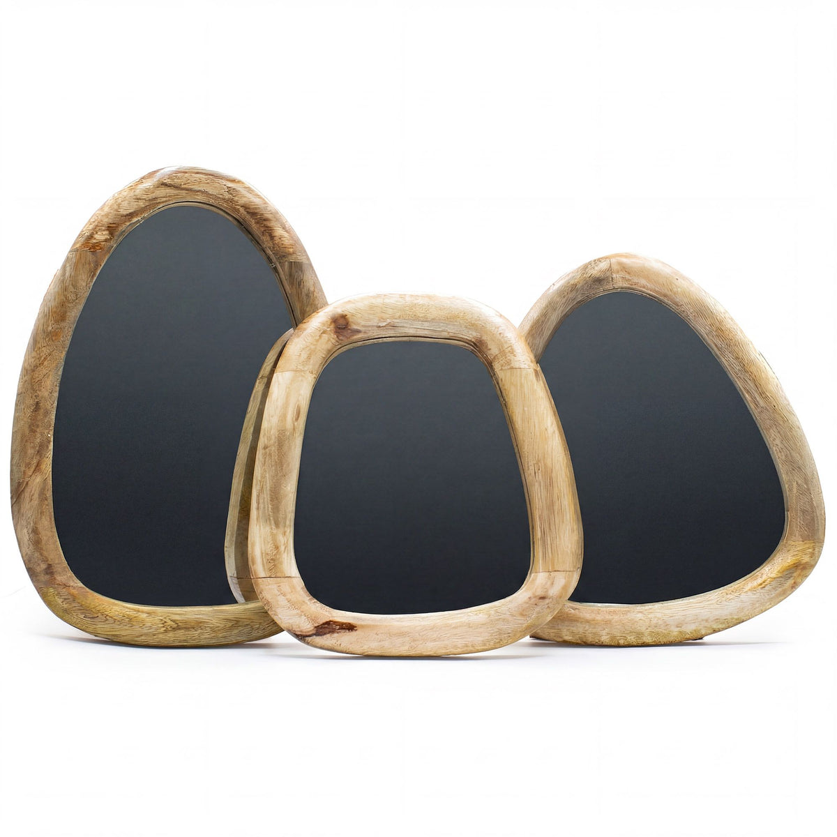 Three pebble shaped mirrors set with wooden frames on a white background