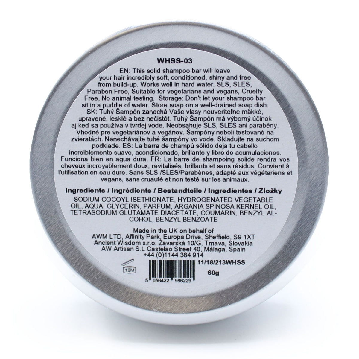 Back label of a solid shampoo bar container with text and product details.