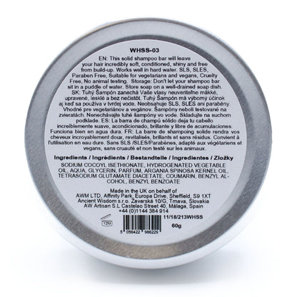 Back label of a solid shampoo bar container with text and product details.