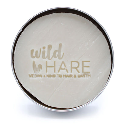 Round container Eco-Friendly Coconut Shampoo Bar with 'wild hare' branding on a white background