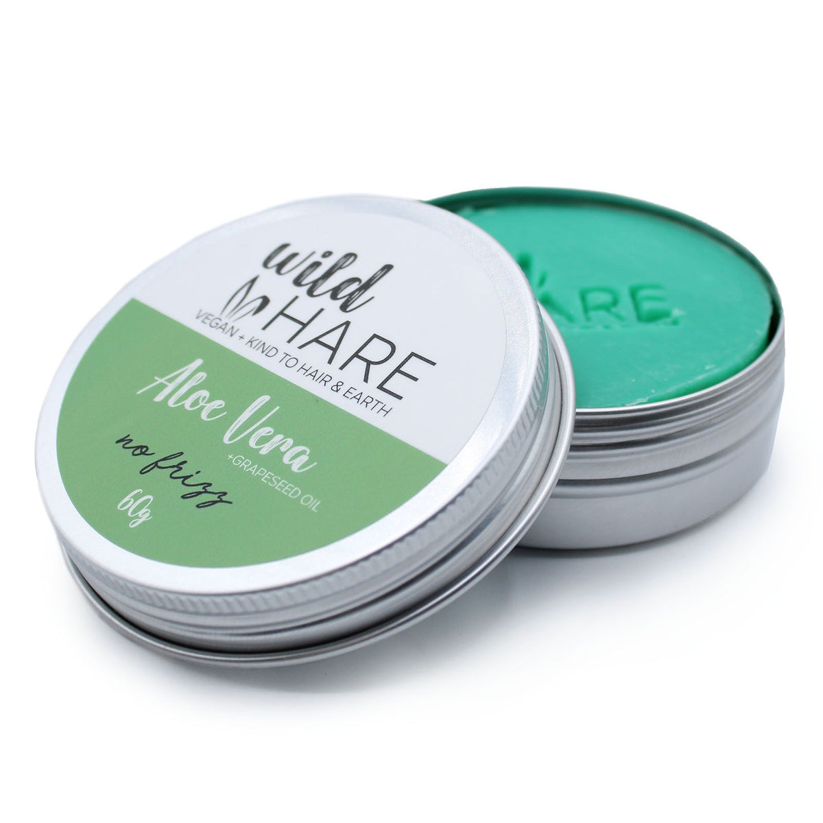 Open container of 'wild hare' Aloe Vera Solid Shampoo Bar on a white background