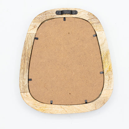 Back of a wooden pebble shaped mirror on a white background
