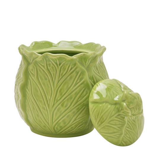 Green ceramic container with cabbage design on a white background